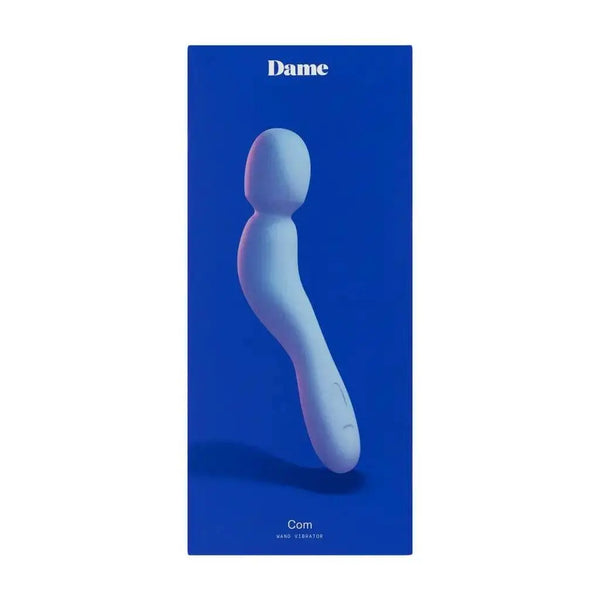 Dame Com wand vibrator in periwinkle blue displayed on brand packaging box
