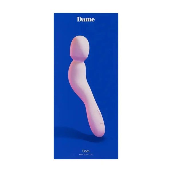 Dame Com Wand Vibrator in quartz pink displayed against deep blue product packaging