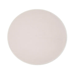 Dame Throw in oat laid flat, showing the smooth circular shape and neutral cream tone