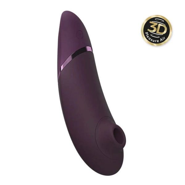 Dark purple Womanizer Next with smooth silicone finish and rose-gold accent strip, 3D Pleasure Air tip