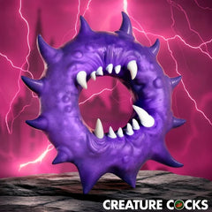 Creature Cocks Constrictor Silicone Cock Ring – purple ring with fang-shaped opening and soft spikes