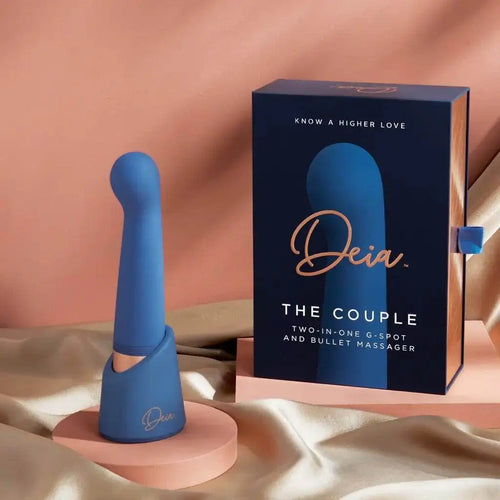 Deia The Couple two-in-one G-spot and bullet massager in navy blue with rose gold base beside box