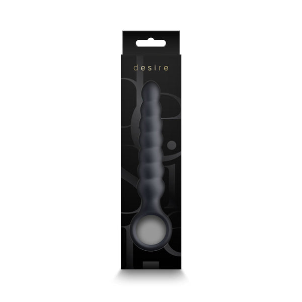 Desire Lucent wand displayed inside open retail box, showing smoke grey beaded shaft and loop handle