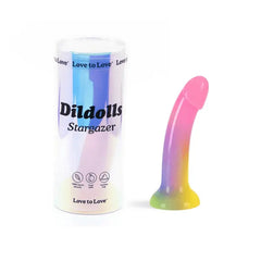 Dildolls Stargazer dildo beside clear cylindrical Love to Love branded packaging tube