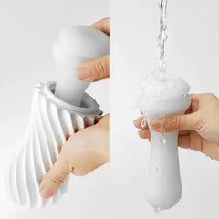 Disassembled Flex sleeve being rinsed under running water for easy cleaning