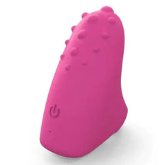 Dorcel Magic Finger pink silicone finger vibrator angled view showing textured nubs and power button