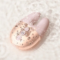 Double Vibe with water droplets on surface demonstrating waterproof silicone construction