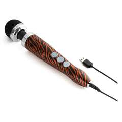 Doxy Die Cast 3R wand massager connected to USB charging cable, showing charging port