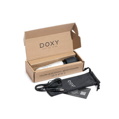 Doxy Go unboxed showing wand, USB charging cable, storage pouch, and instruction card