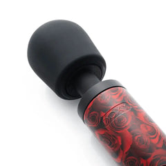 Close-up of Doxy Original wand silicone head and rose-patterned handle neck detail