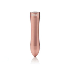 Doxy rechargeable bullet vibrator upright in rose gold, control buttons visible at the top