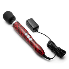 Doxy rose pattern wand massager shown horizontally with attached power cord and AC adapter