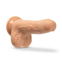 Dr. Grey realistic silicone dildo shown horizontally, displaying suction cup base and textured shaft