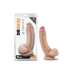 Dr. Skin Mr. Mayor 9-inch dildo with balls beside retail packaging, vanilla tone