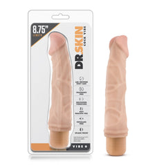 Dr. Skin Vibe 6 beige vibrating dildo beside retail packaging, 8.75-inch length