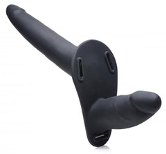 Close-up of dual-shaft silicone insert showing charging port and harness attachment slots