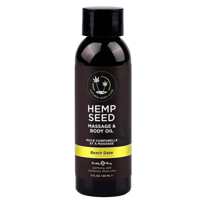 Earthly Body Hemp Seed Massage Oil in Beach Daze scent, dark 2 fl oz bottle with black cap