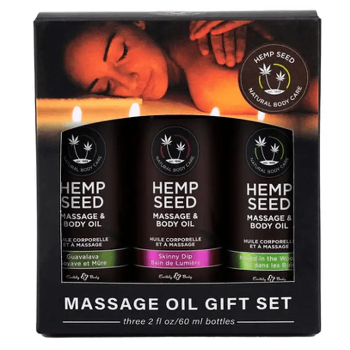 Earthly Body Hemp Seed Massage Oil Gift Set with three 2 fl oz scented bottles in black packaging
