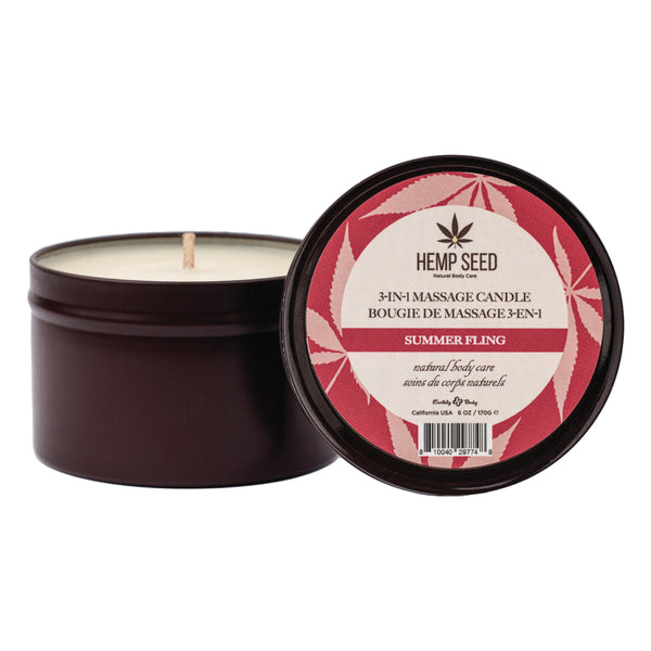 Earthly Body massage candle open beside lid revealing white wax and cotton wick inside