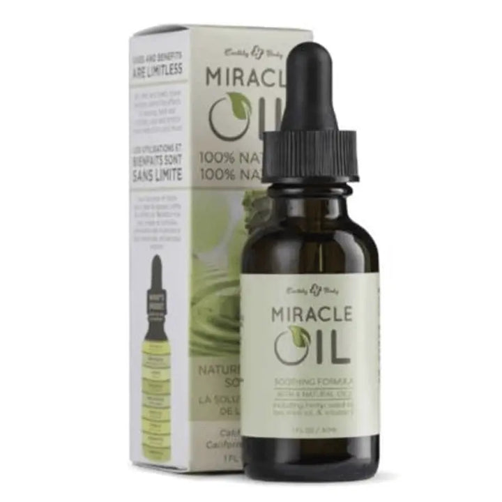 Earthly Body Miracle Oil 1 fl oz dropper bottle beside its green 100% natural box