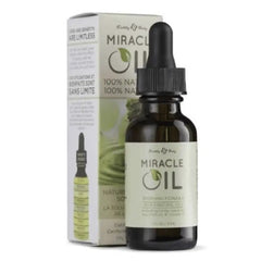 Earthly Body Miracle Oil 1 fl oz dropper bottle beside its green 100% natural box