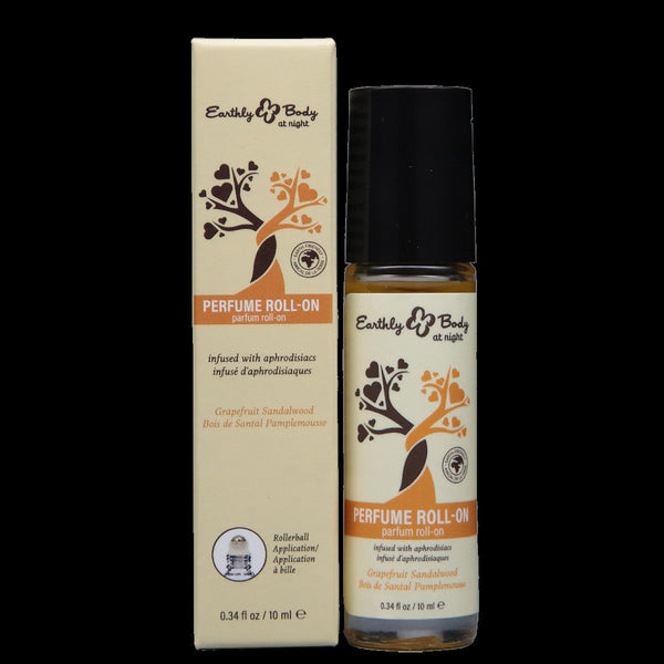 Earthly Body At Night Grapefruit Sandalwood Perfume Roll-On bottle beside cream box