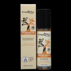 Earthly Body At Night Grapefruit Sandalwood Perfume Roll-On bottle beside cream box