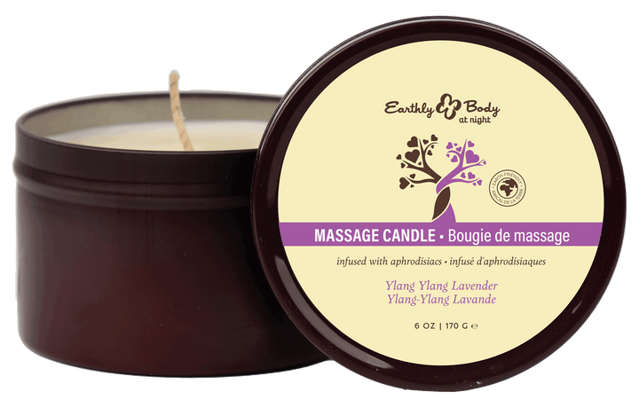 Earthly Body Ylang Ylang Lavender massage candle in a round burgundy tin, lid open