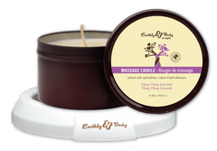 Earthly Body Ylang Ylang Lavender massage candle tin open lid showing cream wax and cotton wick