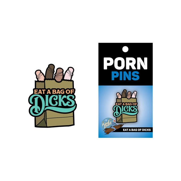 Eat a Bag of Dicks enamel pin shown beside its Porn Pins retail card backing, black and blue packaging