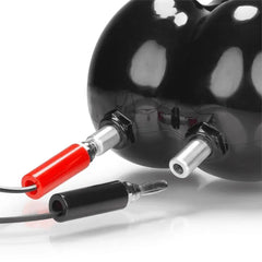Close-up of electro ballbag steel ports connected to red and black e-stim lead wires