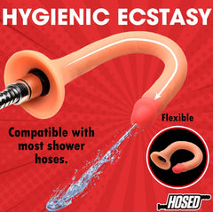 Enema hose connected to shower hose adapter, highlighting flexible silicone construction