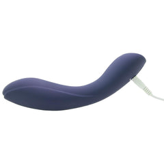 Evolved Coming Strong lying flat with white USB magnetic charging cable attached to base