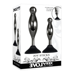 Evolved Joy Sticks anal plug set in gunmetal finish shown in retail box with flexible base callout