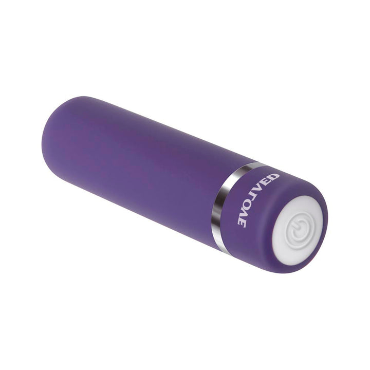 Evolved Purple Passion bullet vibrator in matte purple silicone with silver accent ring and power button