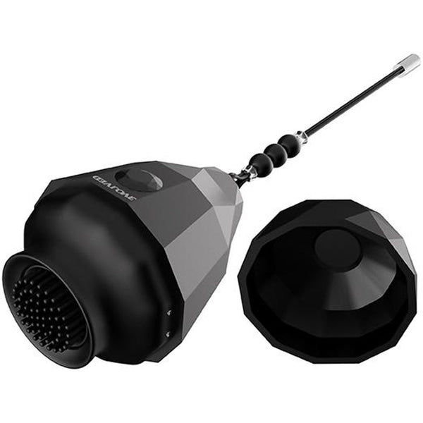 Evolved Spinning O black silicone vibrator with faceted body, bristle head, and detached cap