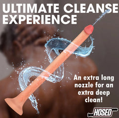Extra long slim enema nozzle shown in shower context with water spray for deep cleansing