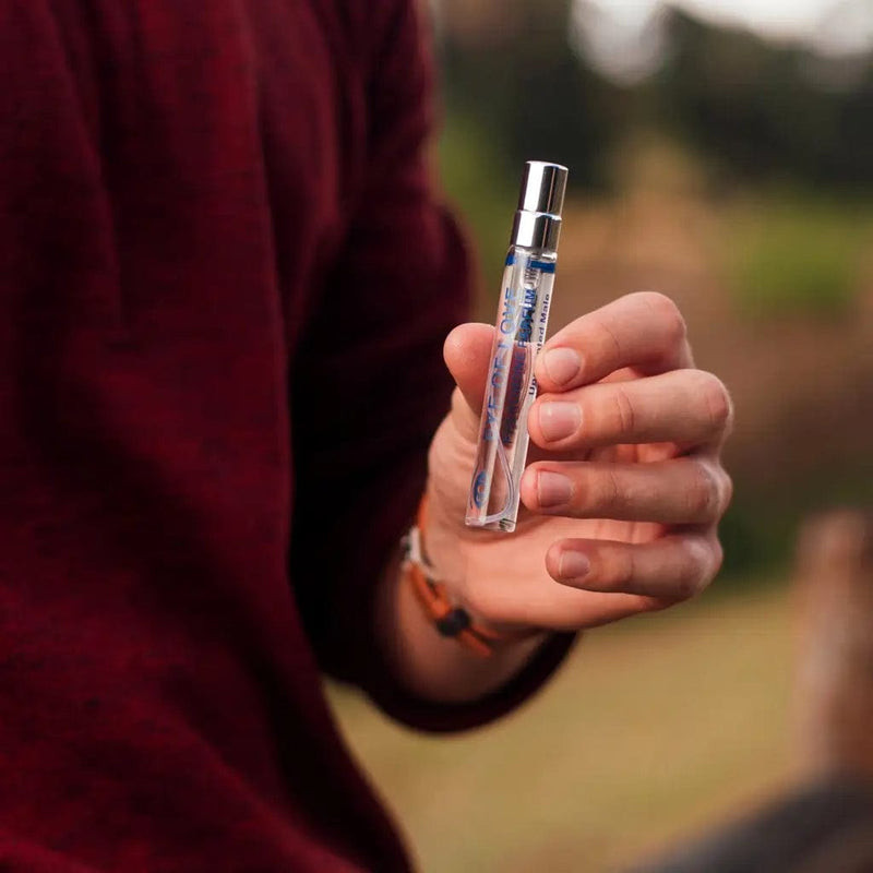 a men holding pheromones