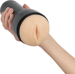 Feel Generic pale CPB-V2 sleeve partially extended from casing, held by one hand showing full length