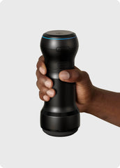 Feel by Kiiroo PowerBlow device held upright, blue LED ring and control buttons visible