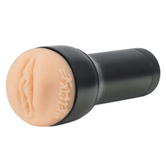 Feel Melrose stroker removed from box, showing skin-tone sleeve seated in black case