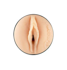 Close-up of FeelReagan Foxx Stroker opening showing realistic skin-tone sculpted detail