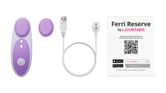 Ferri Reserve by Lovense unboxed with magnetic charging cable, extra cap, and instruction card