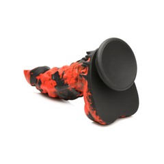 Fire Demon silicone dildo laid horizontally displaying suction cup base and marbled red texture