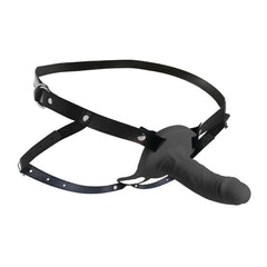 Flat lay of complete Size Matters harness and silicone sheath showing full adjustable strap system