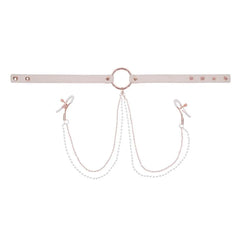 Flat lay of cream faux-leather adjustable collar with draped dual chain clamps
