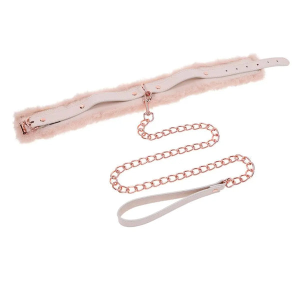 Flat-lay of pink fur collar and rose gold chain leash showing full adjustable length