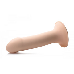 Flesh-tone Squeezable Phallic Dildo side profile highlighting smooth silicone suction base