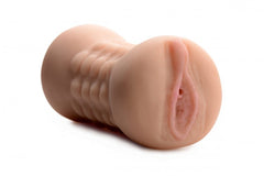 Flesh-toned dual-entry male stroker with ribbed exterior and realistic soft-touch finish