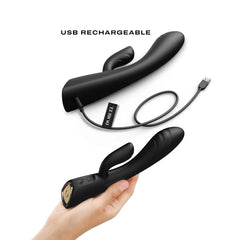 Flexi Rabbit USB charging cable and hand-scale view showing compact black silicone design